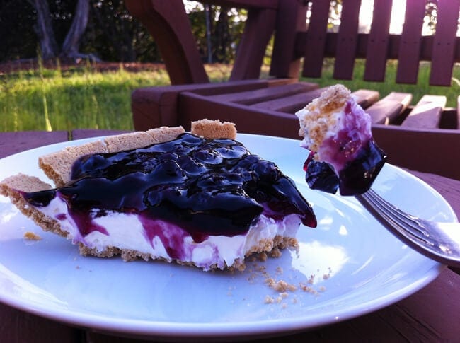 COOL WHIP cheesecake uses cream cheese, Cool Whip and powdered sugar for the filling, and a canned blueberry pie filling as a sweet, easy topping for a cheesecake that whips up in about five minutes.