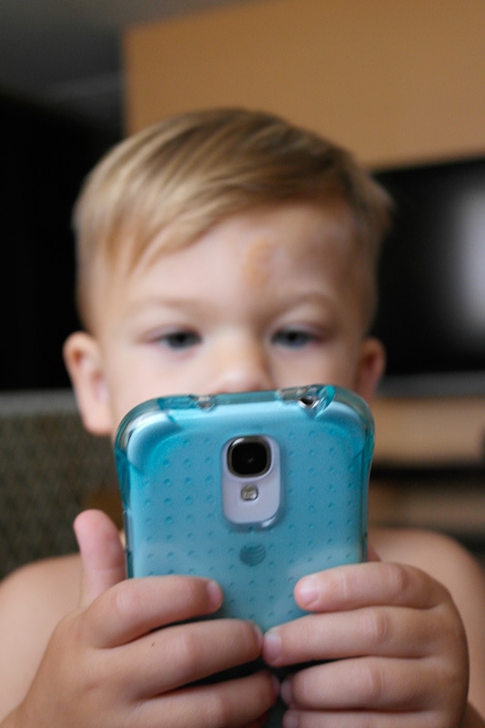 toddler with phone