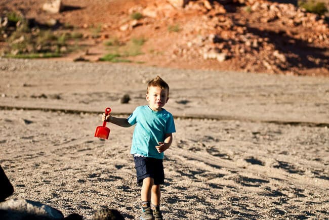 toddler running on the beach