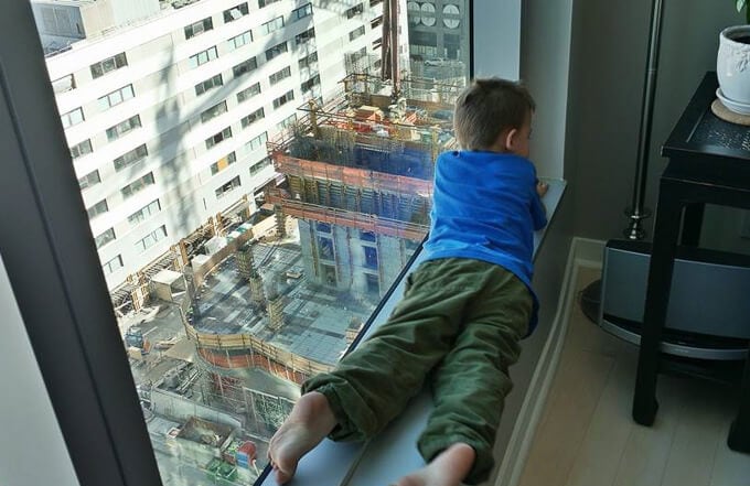 toddler looking down at the world