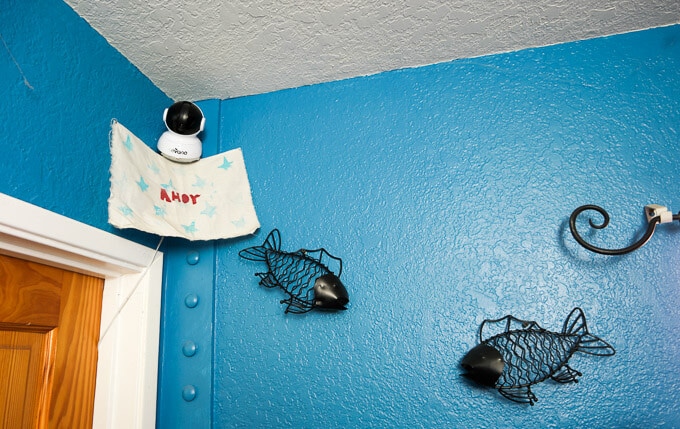 Creating a nautical kids room with found items, new decor and riveted walls