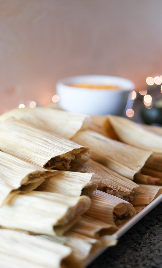 Paleo tamales made with a velvety combination of coconut flour and pumpkin seed flour. It gets its flavor from salsa verde and butter.