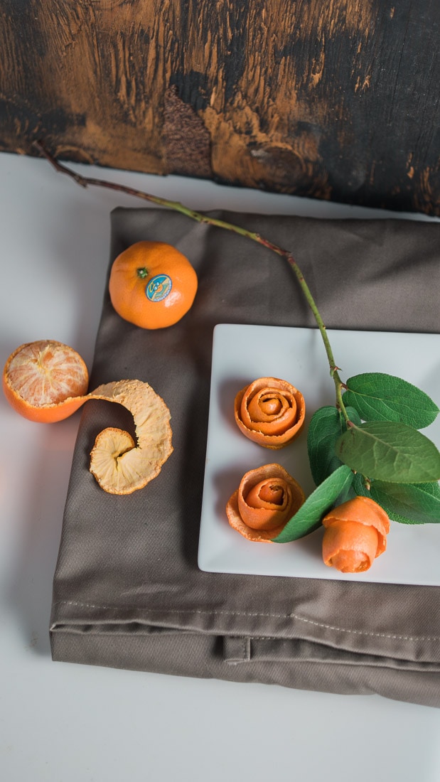 This is a fun food craft. Roll up a mandarin peel to look like a rose!