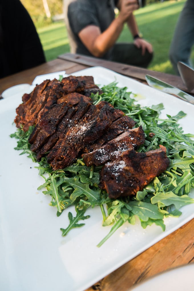Food presentation tips from the happiest hosts: how to cover everything from drinks to dinner with minimal dishes and maximum effect.