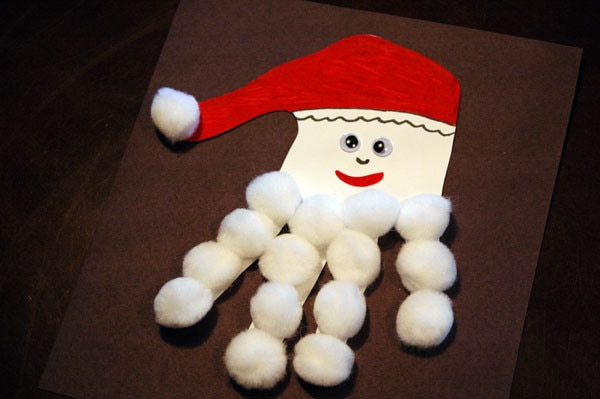 Paper Christmas handprint craft with cotton balls