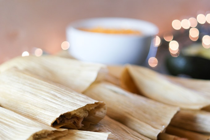 Paleo tamales made with a velvety combination of coconut flour and pumpkin seed flour. It gets its flavor from salsa verde and butter.