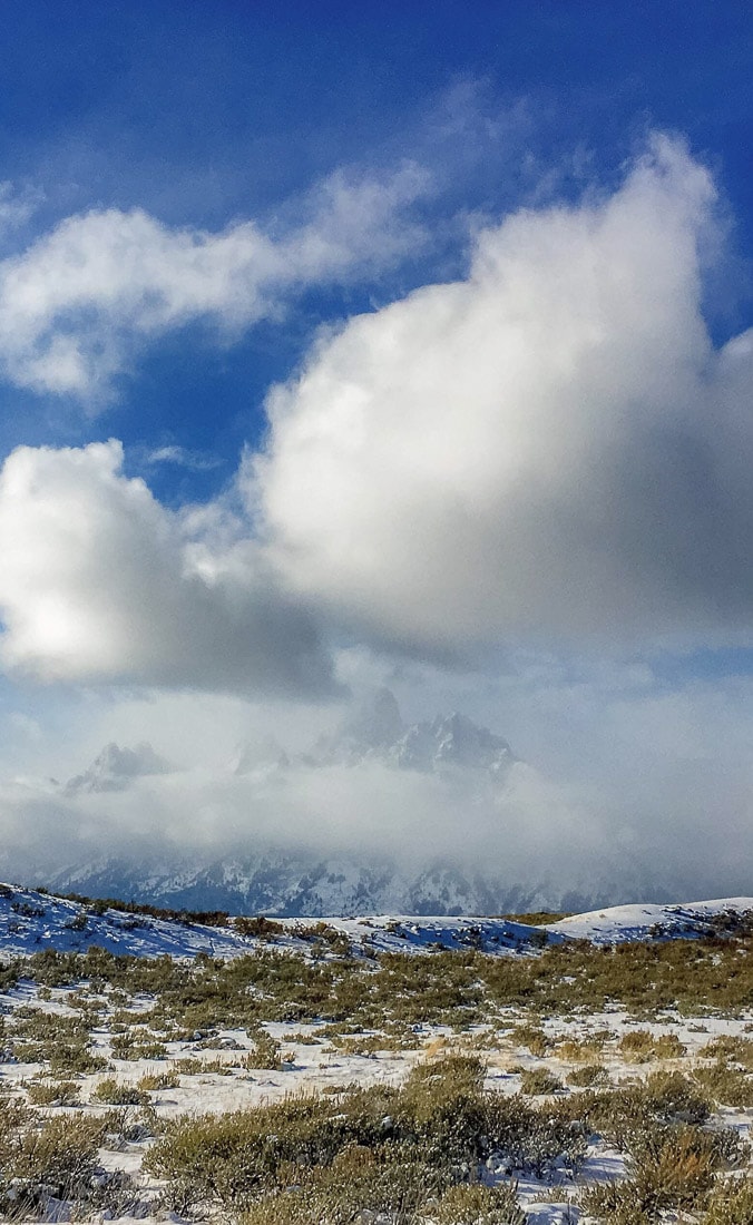 Exploring the bitter cold and clouds of Grand Tetons, Wyoming.