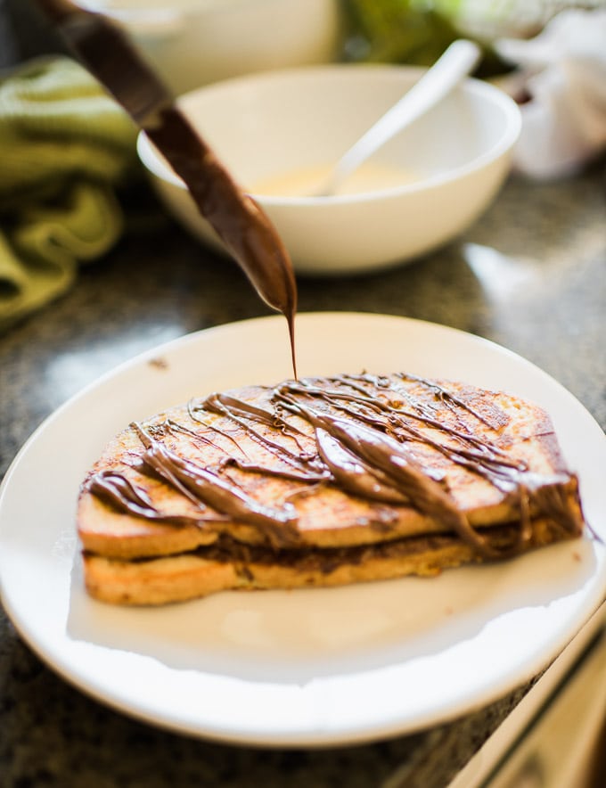 Nutella french toast. Slather Nutella between two slices of bread, dip in french toast batter, cover with more Nutella!