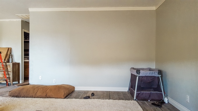 Just a blank wall, waiting for a TV.
