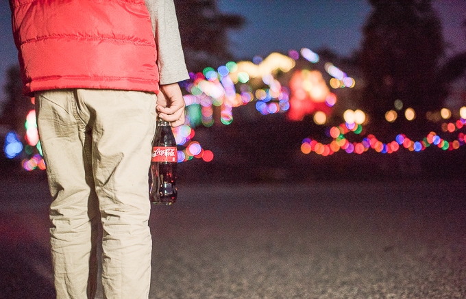Fill a Coca-Cola tote with some festive goodies for a cozy night watching holiday lights.