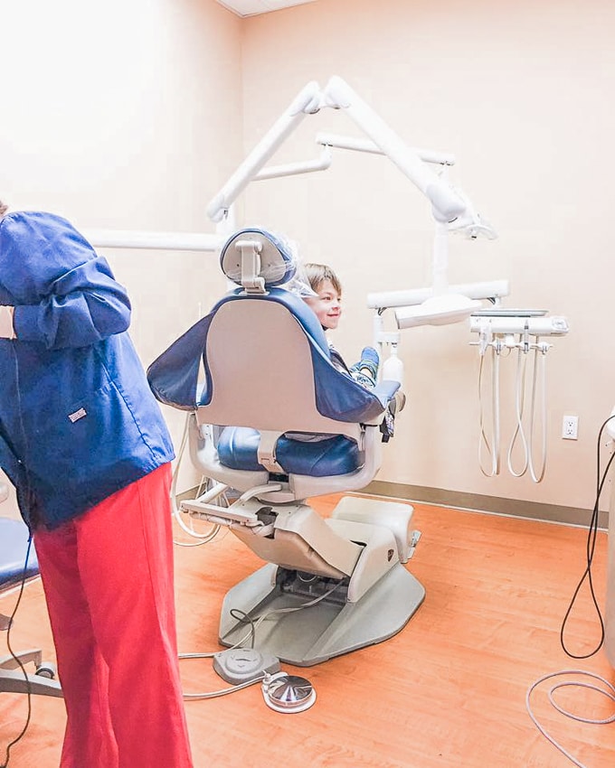 Kid in dentist chair