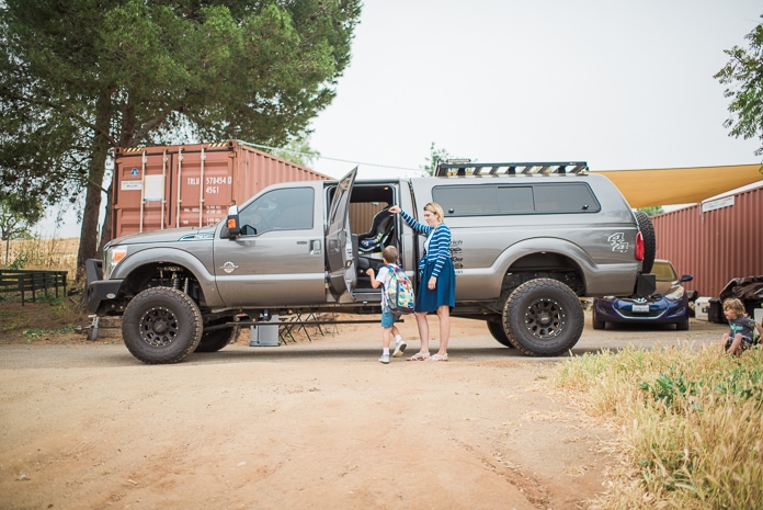 This is motherhood: loading the kids for dad to take to school