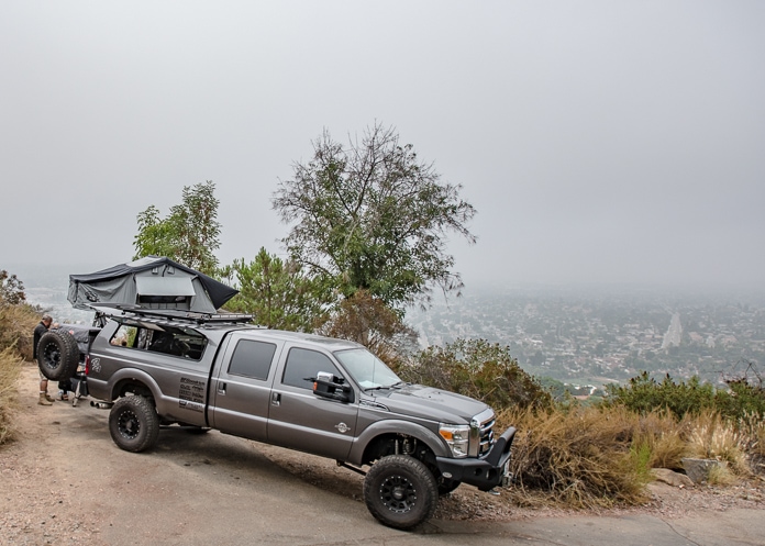 Overland camping truck with rooftop tent