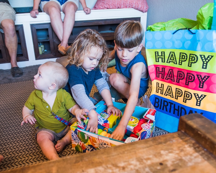 Opening presents on the first birthday