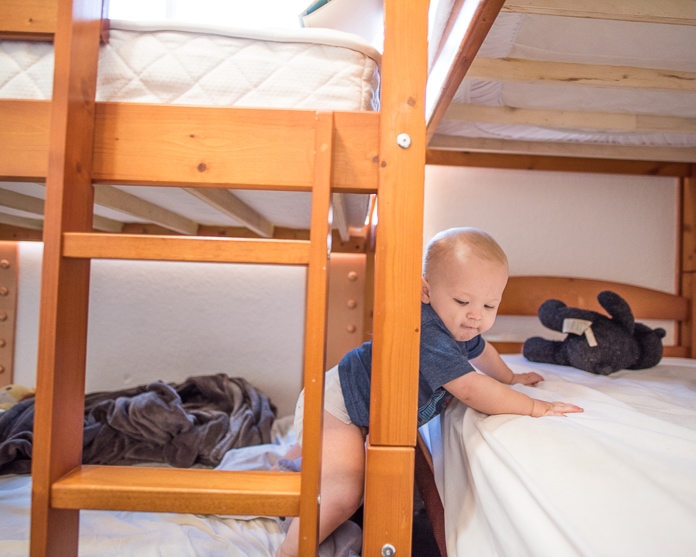 Baby hopping between the bunk beds