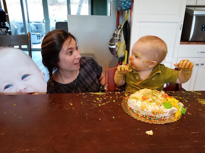 baby eats cake
