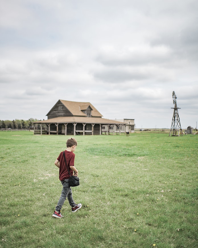 Boy walking on farm