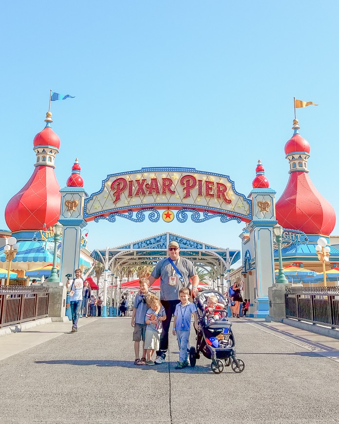 Pixar Pier entrance with family