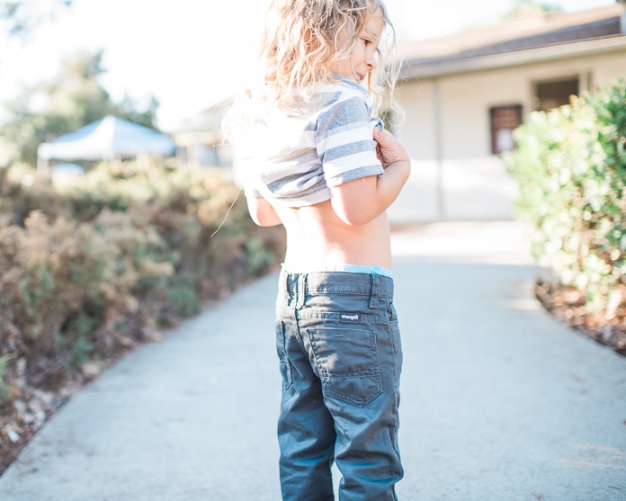 Potty training kid in jeans