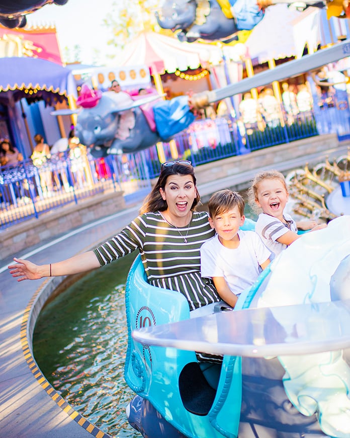 Mom and kids on Dumbo ride at Disneyland