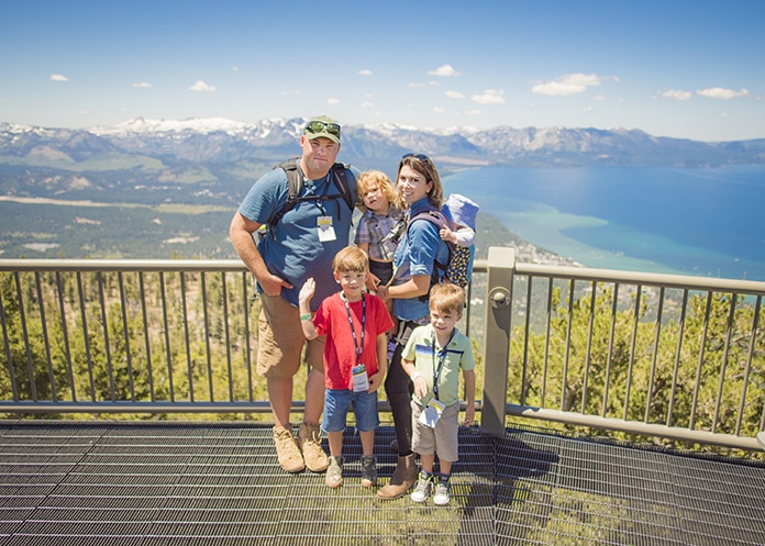 Happy family overlooking lake tahoe