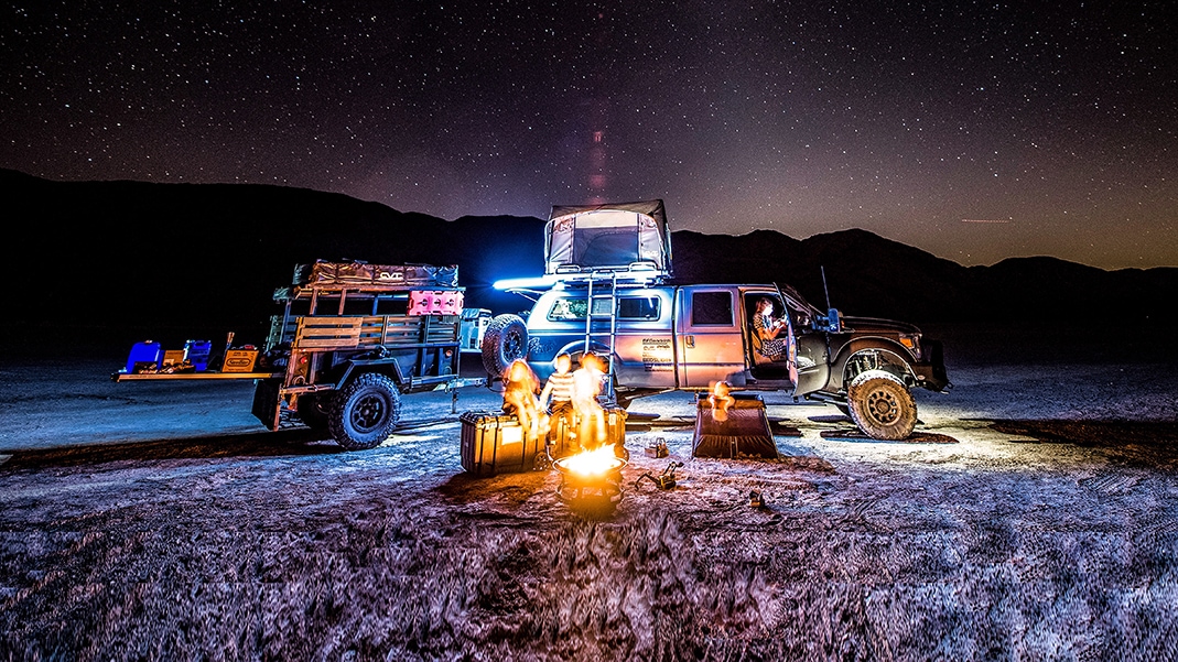Adventure family camping under stary sky