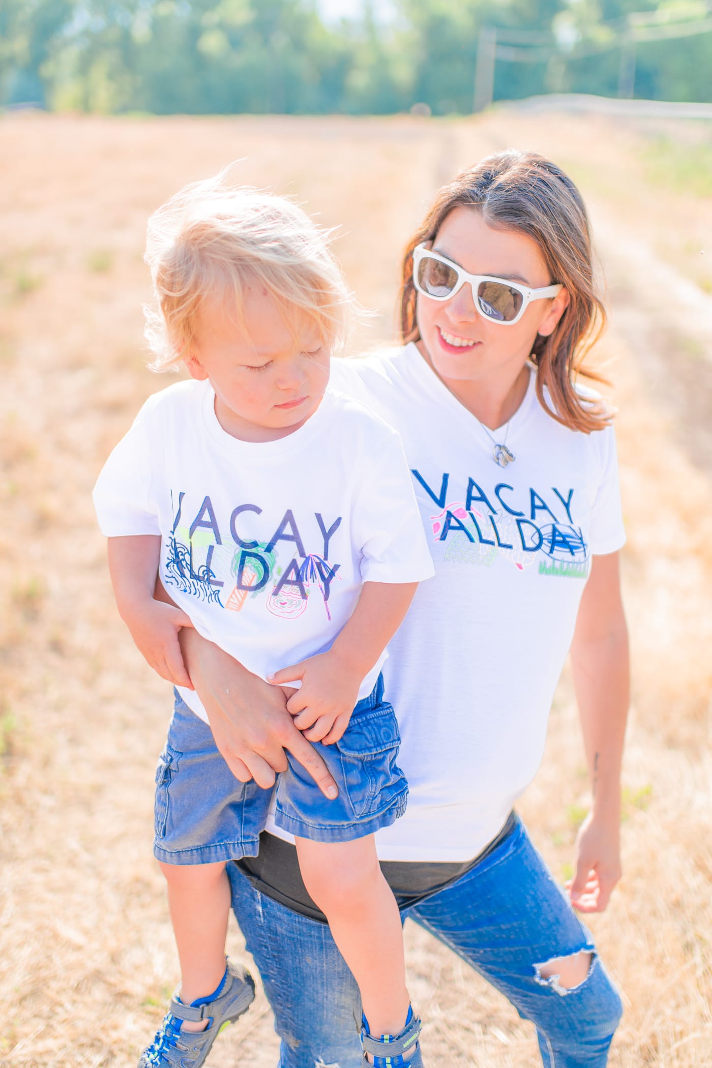 Mom and toddler with family vacation shirts