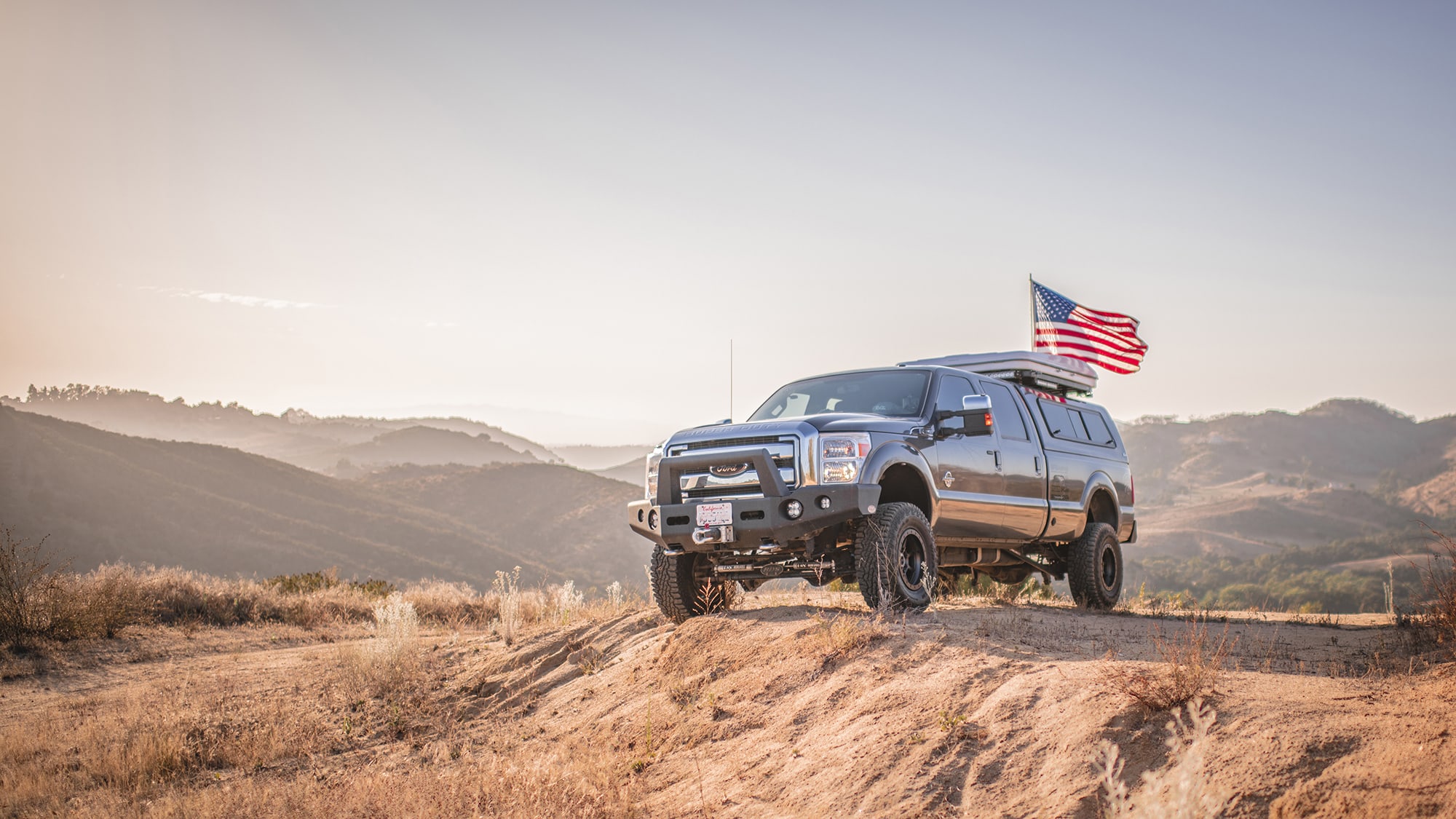 Powerstroke with Goodyear Ultra Terrain Tires and American flag