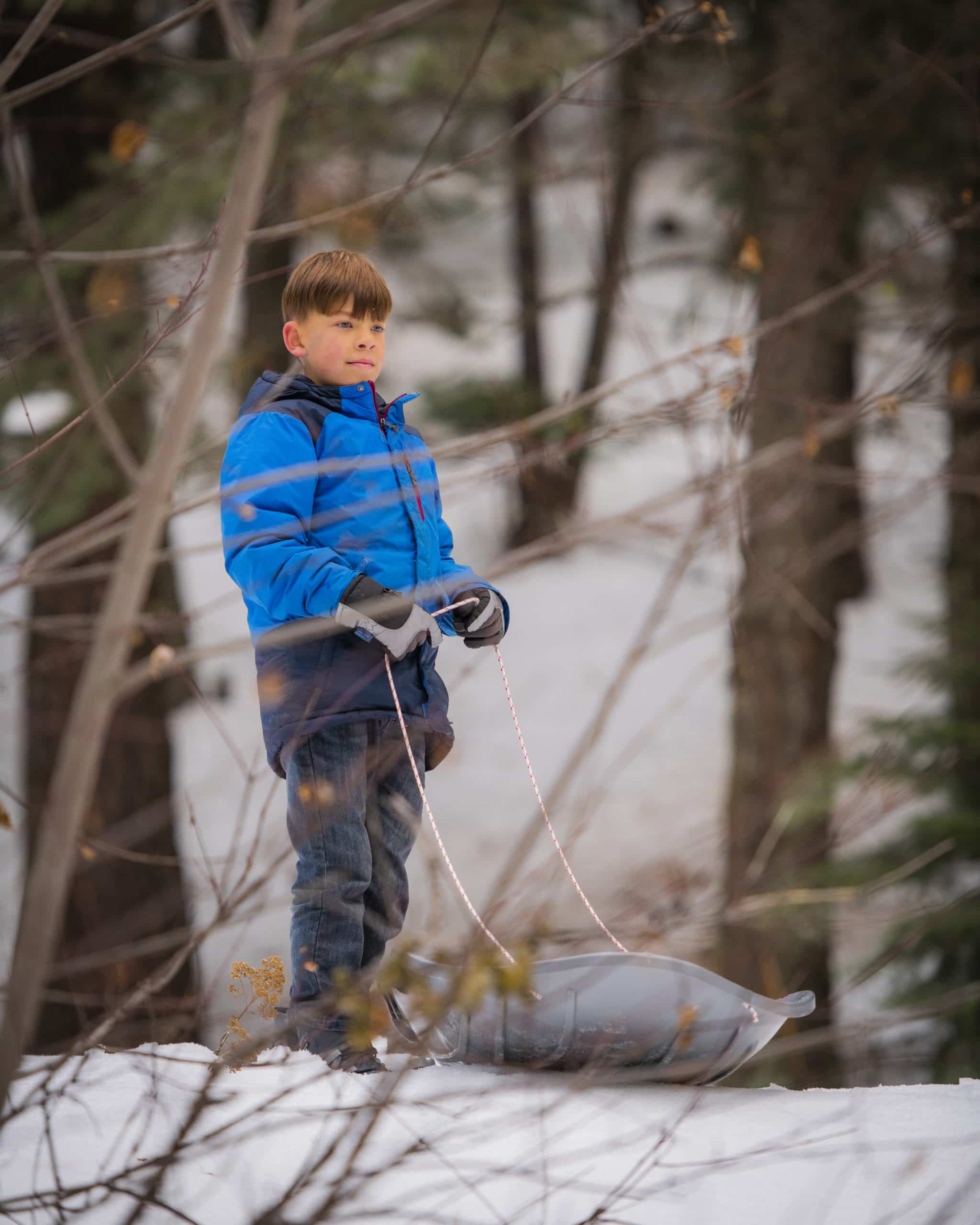 Young boy in snow boots 1