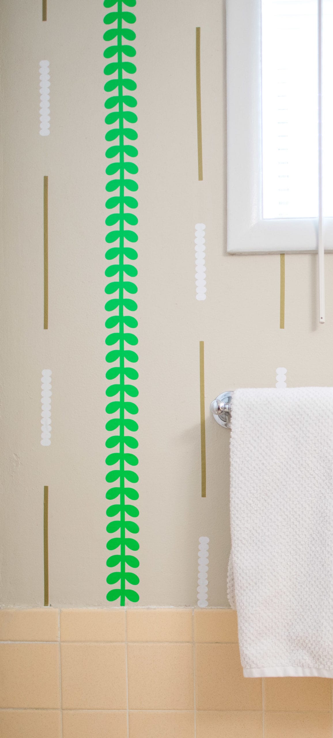 Make DIY removable wallpaper with long strips of vinyl