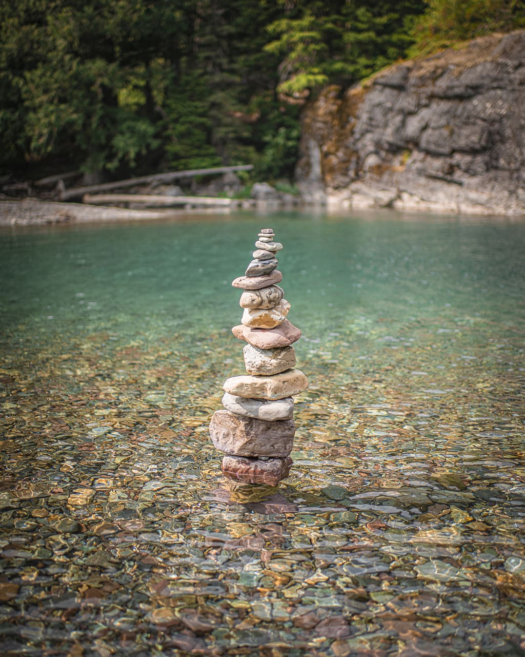 Rock stacking in red rock point glacier national park