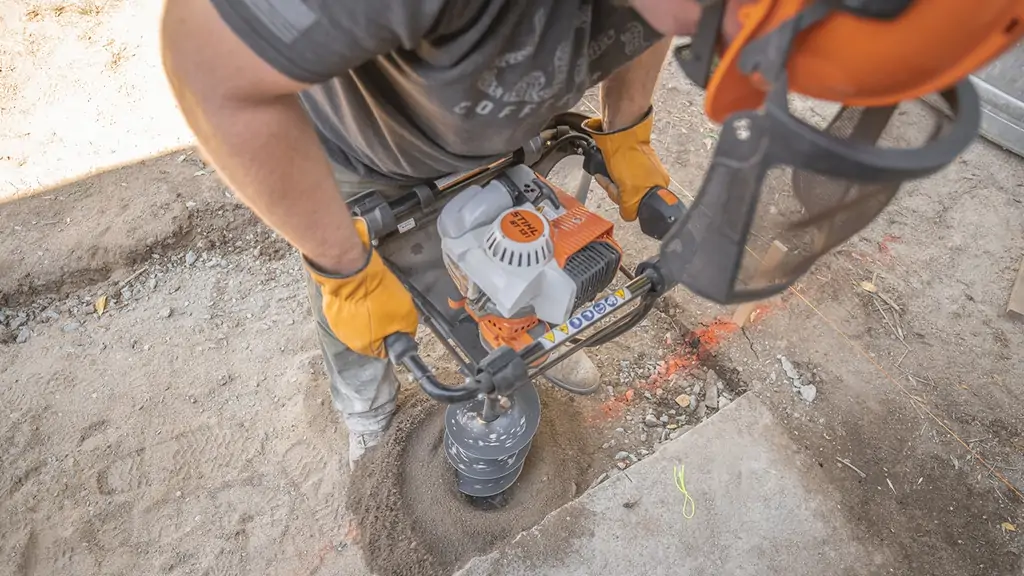 Digging post holes with STIHL BT 131 Nate Day