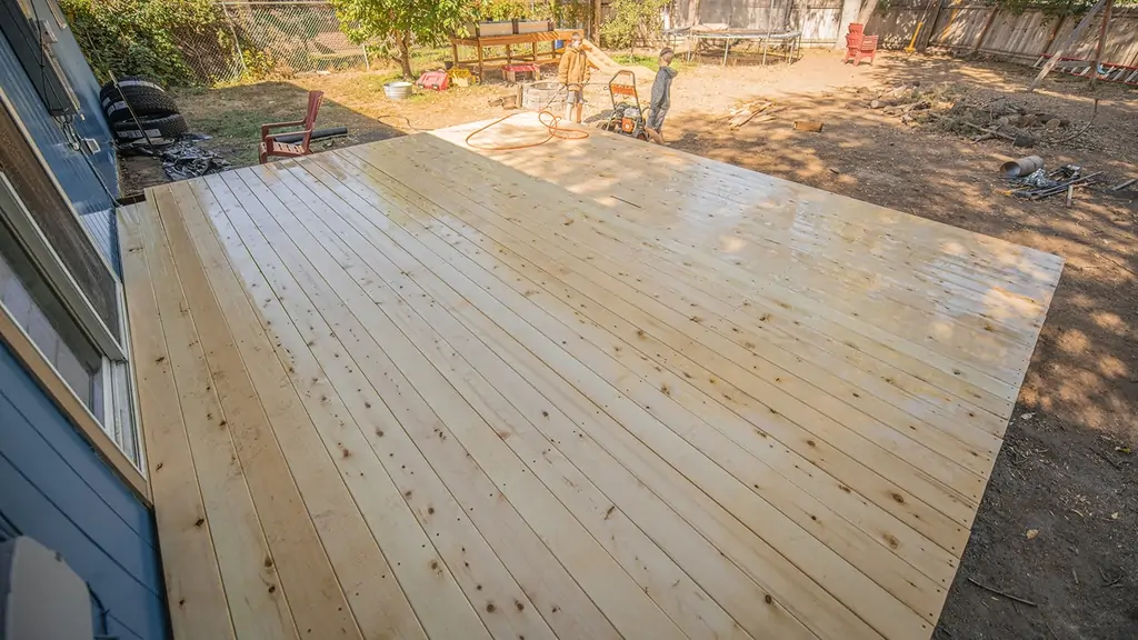 Installing a deck looks really good in a back yard
