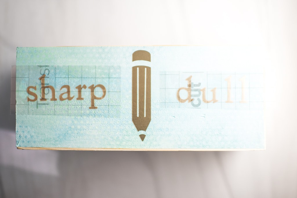 Wooden pencil box marked sharp dull