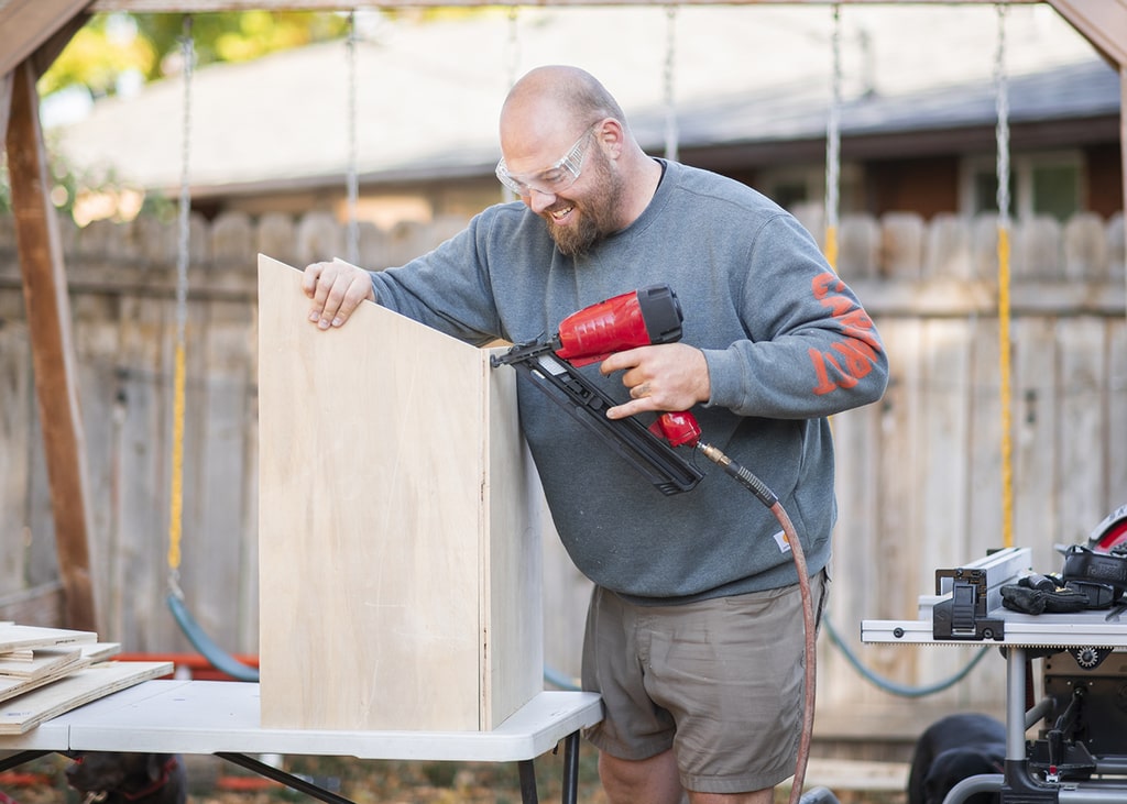 Using a nailgun to build a little free library