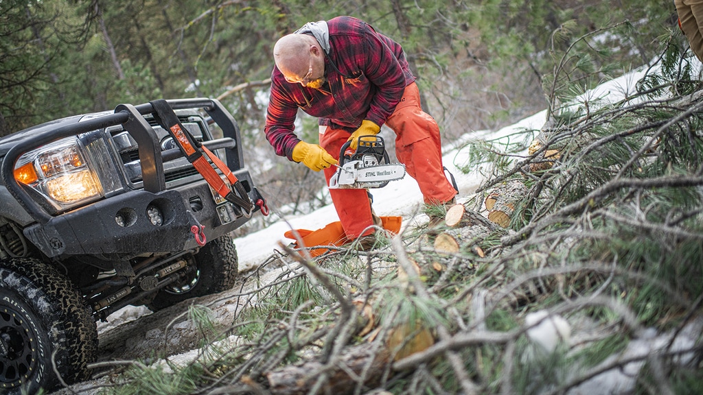 Nate Day using STIHL MS 251 Wood Boss to clear forest road