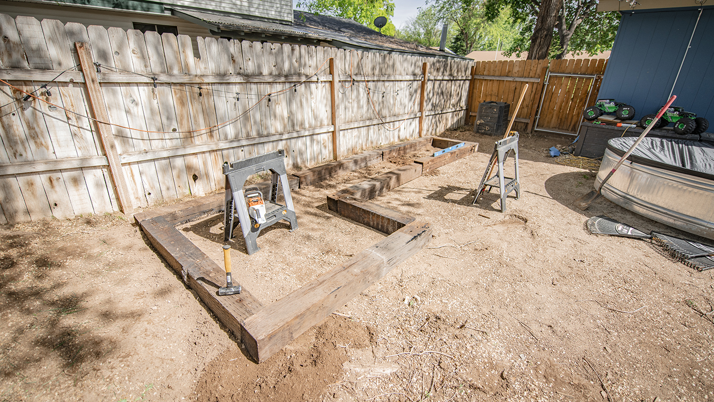Using railroad ties to frame in backyard smokers space